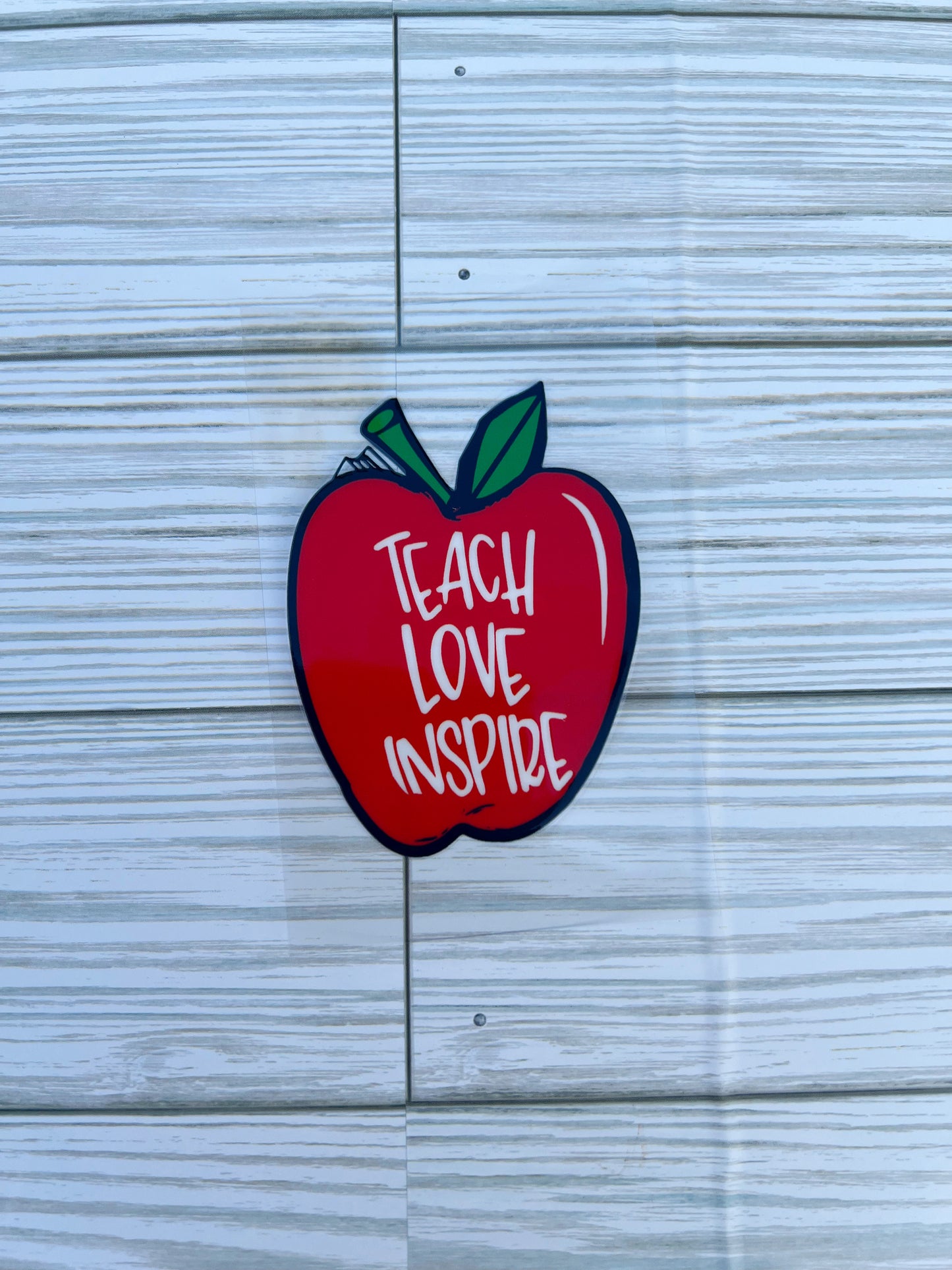 Teach love inspire apple