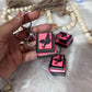 Dragon book lover clicker keychain