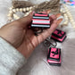 Dragon book lover clicker keychain