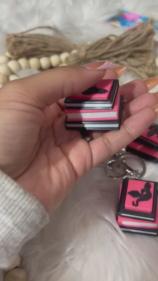 Dragon book lover clicker keychain